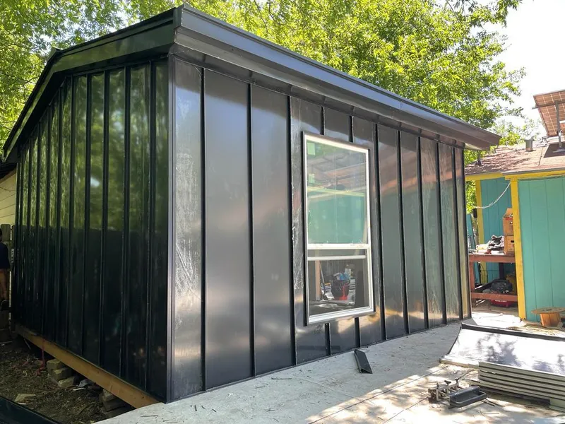 Black standing seam metal wall panels for Metal Roof Installation in Alliance