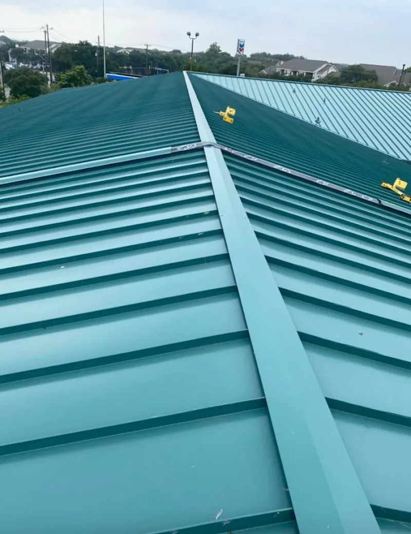Green commercial metal roof ridge and valley for Metal Roof Repair in Alliance